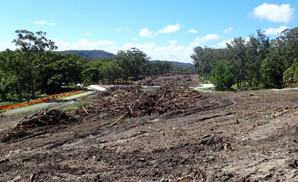 Soil revealed after vegetation is cleared on a block of land